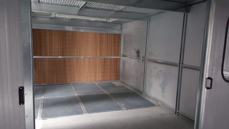 Interior of a spray booth with an installed ALWO V extraction wall