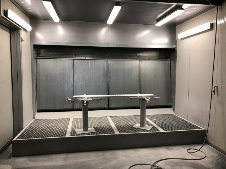 Spray booth fitted with an ALWO W extraction wall and grated floor