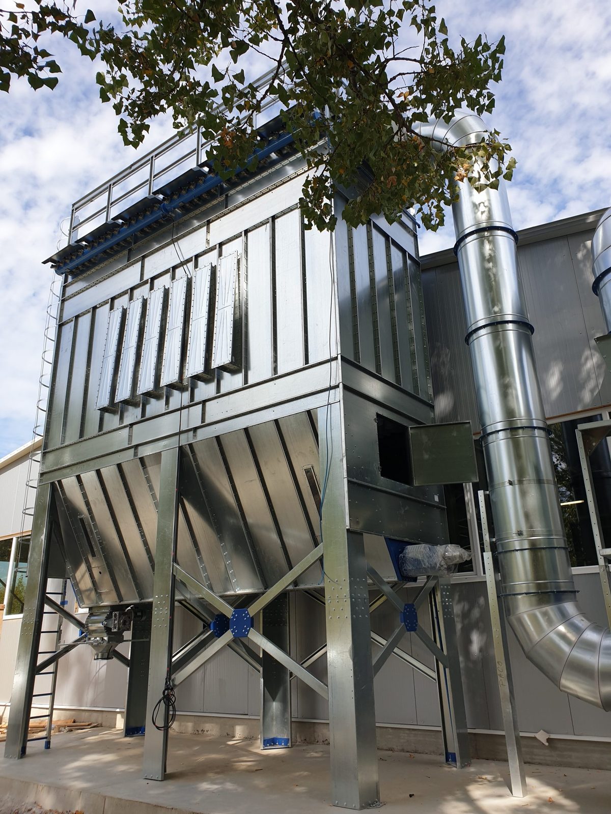 ALWO SFPJ baghouse connected to industrial ductwork